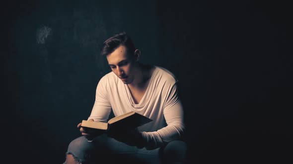 Young Man Reading an Old Book