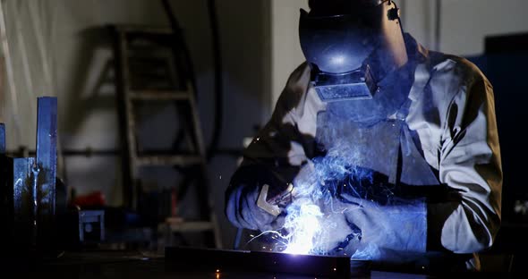 Welder Welding a Metal alt