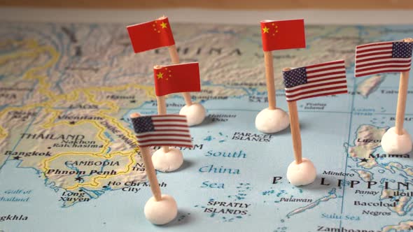 Flags of China and the United States on a Map of the South China Sea