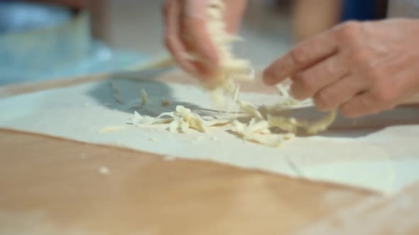 Hands of Professional Chef Making Pita in Restaurant. Cooking Tasty Lavash alt
