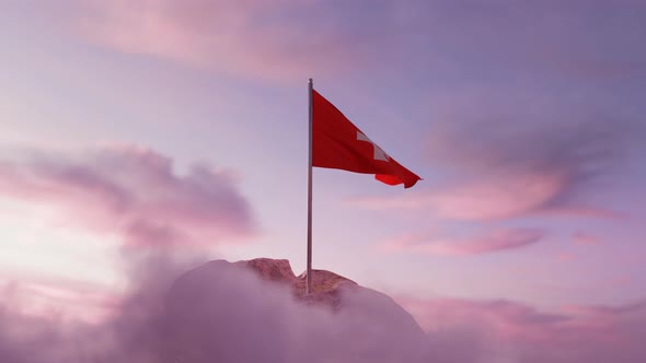 Waving Swiss Flag On Rocky Landscape