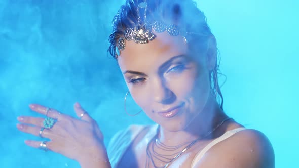 Beautiful Wet Woman Posing in Pool Water Under Neon Color Light alt