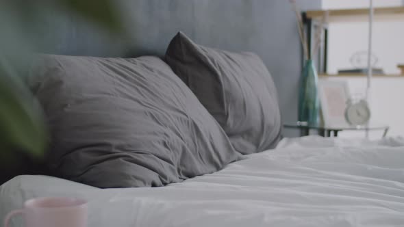 Tired Man Falling Down on Bed and Sleeping alt