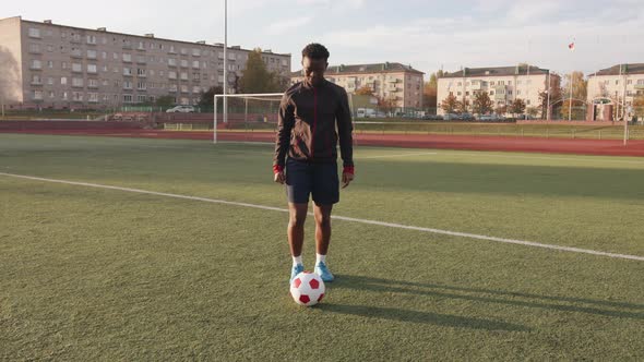 Young Black Girl Training at the City Stadium and Practicing Ball Possession Technique Soccer