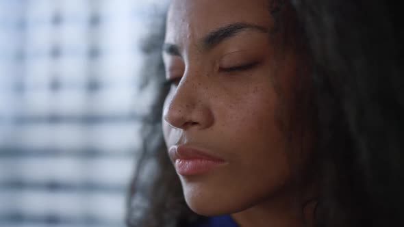 Beautiful African American Business Woman Thinking Ideas in Office Closeup alt