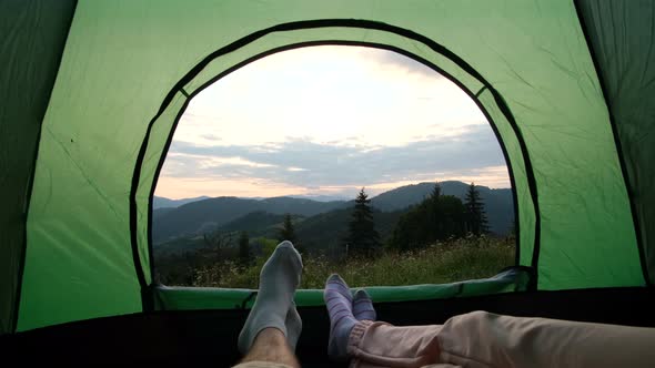 Rest of Tourists in Tents in the Mountains of the Ukrainian Carpathians alt