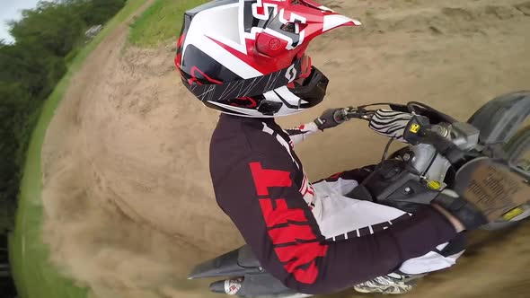 motocross rider back to back corners roosting sand gopro swivel cam side high angle alt