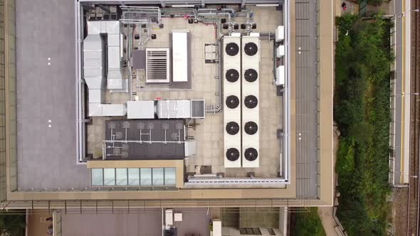 A Drone View of the Ventilation Unit on the Roof of an Apartment Building
