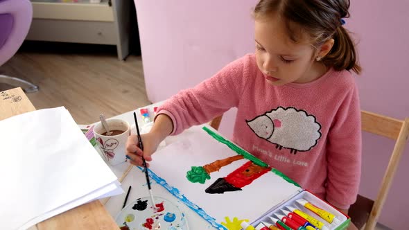 Baby Girl is Painting a Picture