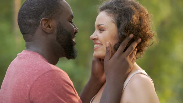 Overjoyed Lovers Hug One Another Delightfully, Look at Each Other Sensually alt