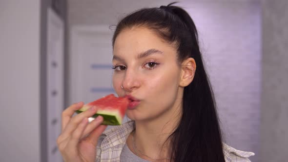 Attractive Woman Biting Watermelon Slice Sayd YAMMY