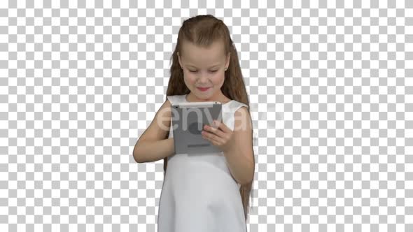 Small girl using tablet computer, Alpha Channel