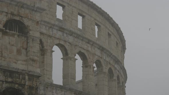 Stone wall at the Roman Arena in Pula alt