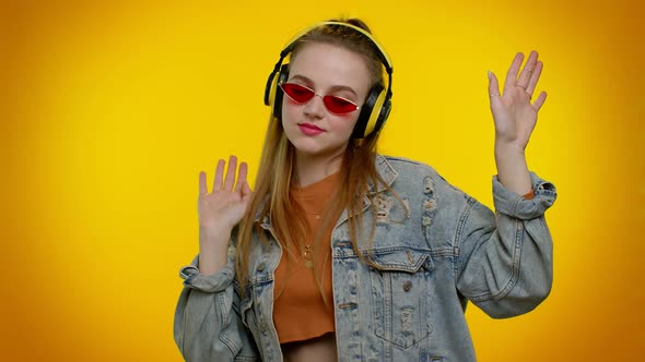 Cheerful Attractive Girl Listening Music Via Headphones and Dancing Disco Fooling Around Having Fun alt