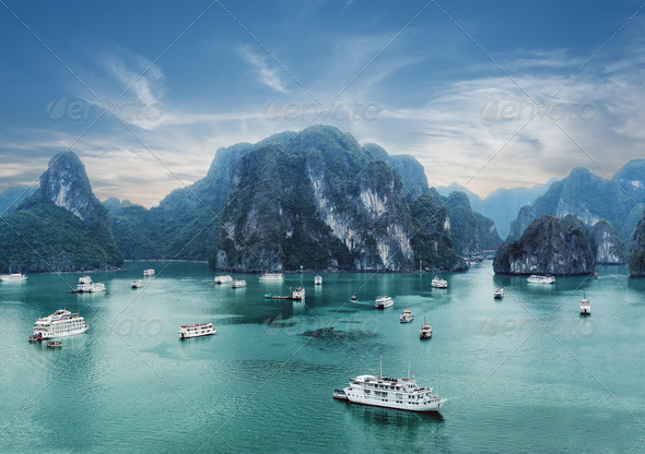 Early morning landscape with blue fog at Ha Long Bay, South China Sea, Vietnam - Stock Photo - Images