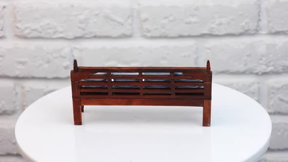 Furniture for dolls, rotation. Living room interior model of wooden furniture alt