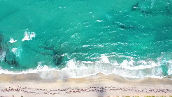 Crystal clear deserted beach coastline alt