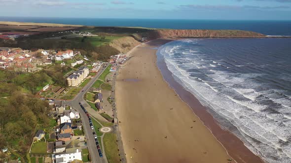 Aerial footage of the British seaside town of Filey, the seaside coastal town is located in the UK alt
