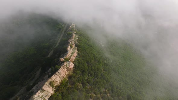 Bright White Cloud Above Edge of Green Peak  Broll Outdoor Nature Background alt