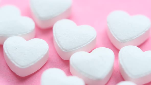 Background with heart shaped medical pills