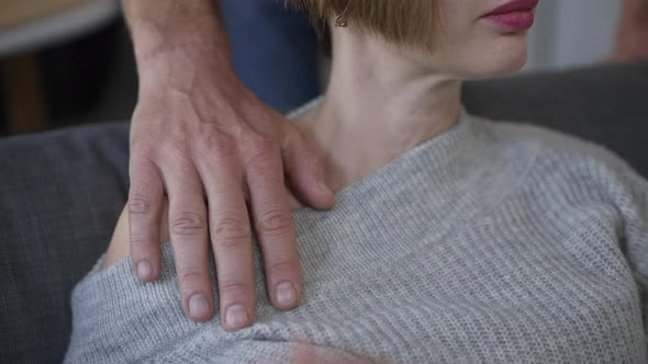 Unrecognizable Slim Young Woman Touching Male Hand on Shoulder Closeup alt