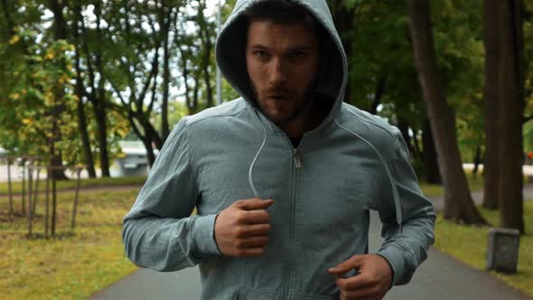 Fighter Running at Park and Brandish Hands Like Boxing alt