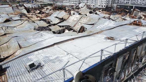 Wartorn Building of a Shopping Center in Bucha Ukraine alt