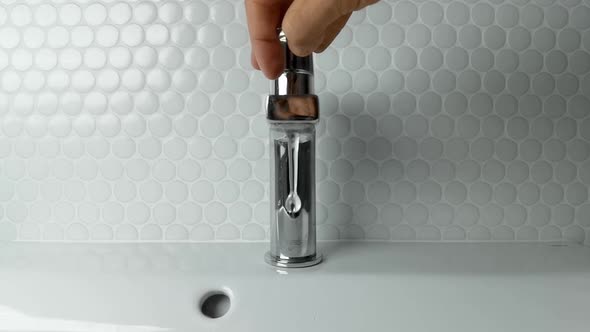 Water Out of Tap in Slow Motion