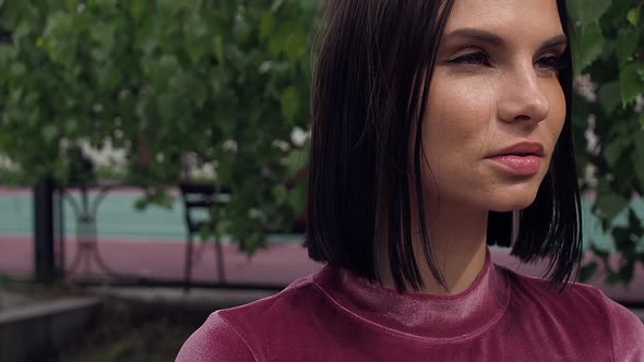 Adult Alluring Brunette in Summer Park alt