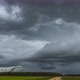 Atmospheric Storm Clouds Fast Moving Over the Ground. Climate Change and Global Warming - VideoHive Item for Sale