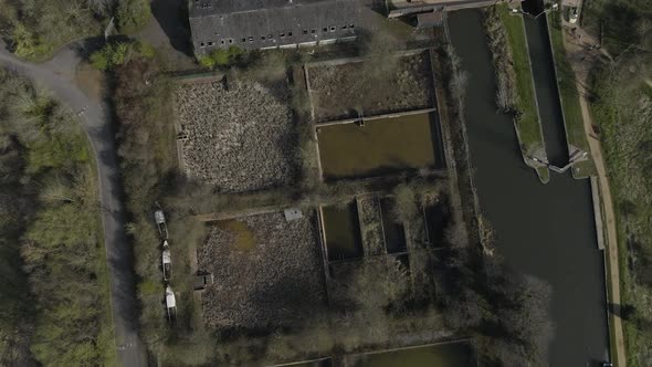 Birds-Eye-View Of Old Water Treatment Works By Avon Canal, Aerial Overhead, Open Sewage Pools, UK Sp