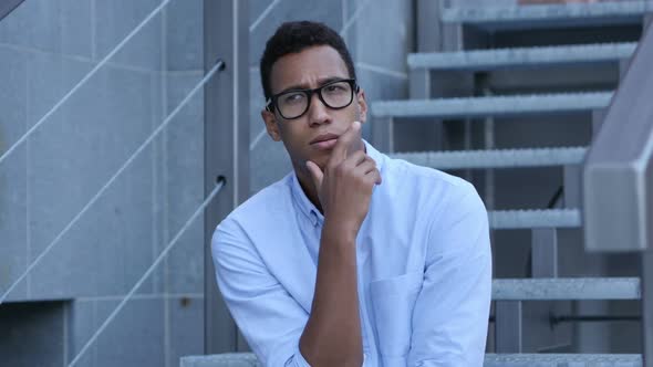 Thinking Young Black Man alt