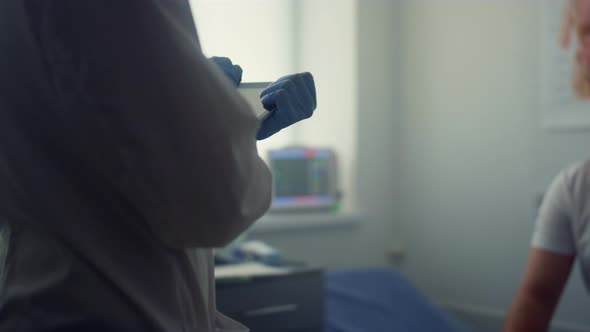 Patient Man Sitting Clinic Couch Listening Doctor Medical Appointment Close Up alt