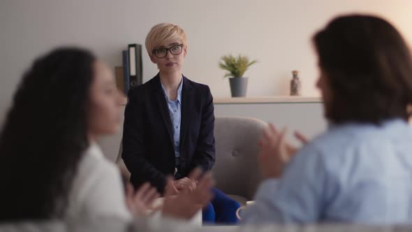 Emotional Married Couple Having Argument on Consultation with Psychologist Professional Counsellor alt