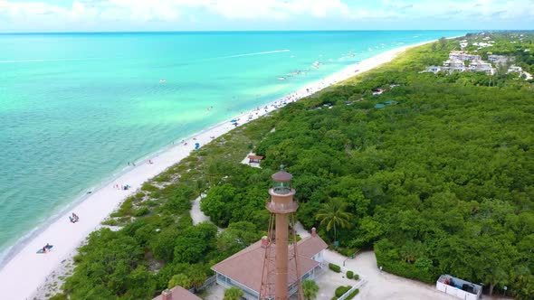 Beautiful drone shot of a lighthouse on Sanibel Island Florida. alt