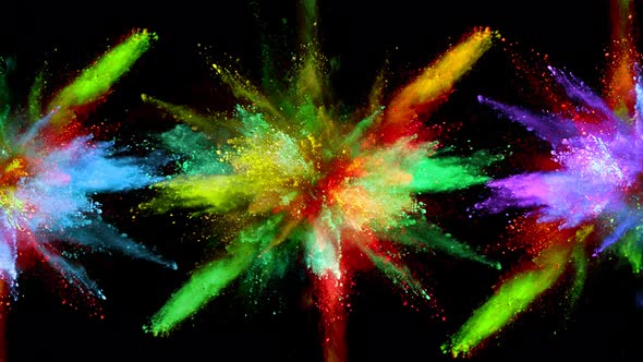 Super Slowmotion Shot of Color Powder Explosions Isolated on Black Background alt
