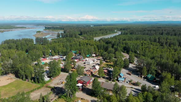 4K Drone Video of Downtown Talkeetna, AK along the Susitna River with Denali Mountain in Distance on alt