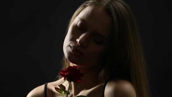 Self-Confident Feminine Female Stroking Skin With Rose, Seduction and Sexuality alt
