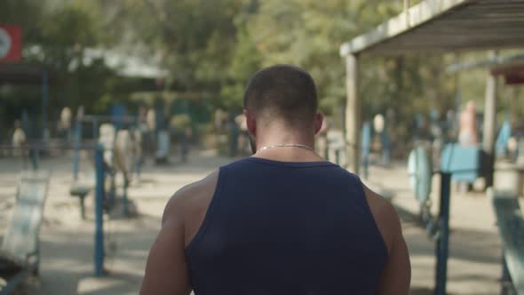 Muscular Brutal Guy Ready for Strength Training alt