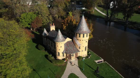 Curwood Castle in Owosso, Michigan with drone shot zooming out. alt