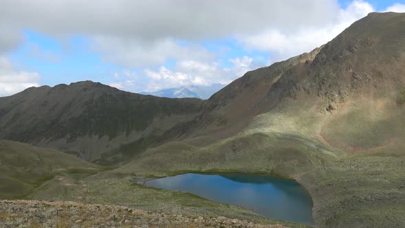 View lake scenes in mountains, national park Dombay, Caucasus alt