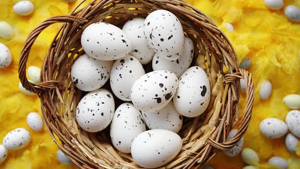 Easter Holidays Concept. White Dotted Chicken Eggs in the Wicker alt