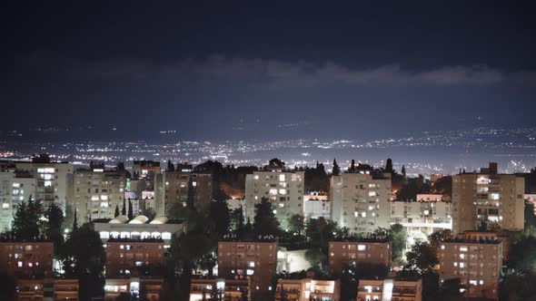 Timelapse of clouds moving above city alt