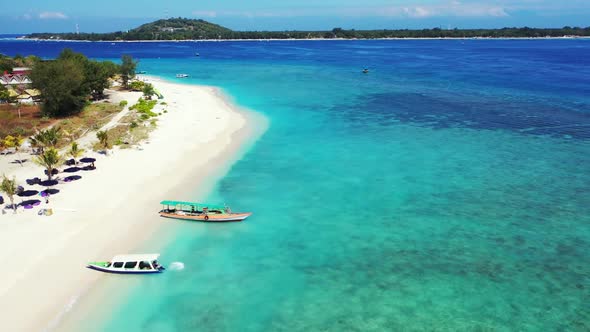 Aerial view seascape of relaxing shore beach trip by shallow water and white sand background of jour alt
