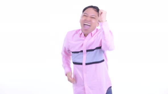 Happy Japanese Businessman Getting Good News alt