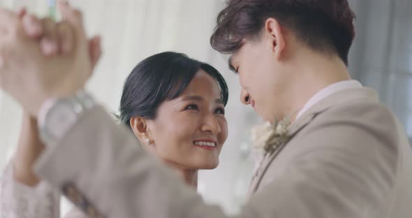 Happy Asian Bride And Groom In Wedding Dress Prepare For Married In Wedding Ceremony. alt