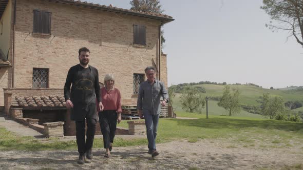 Senior couple on holiday visiting vineyard