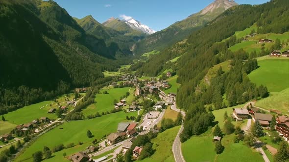 Picturesque village of Heiligenblut in the Alps from air alt