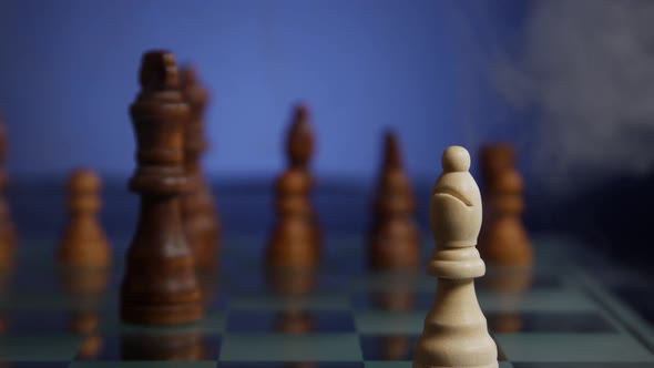 Hand Moving the Bishop on a Chess Game 