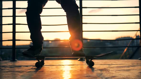 Man Jumping on a Skateboard on a City Background alt